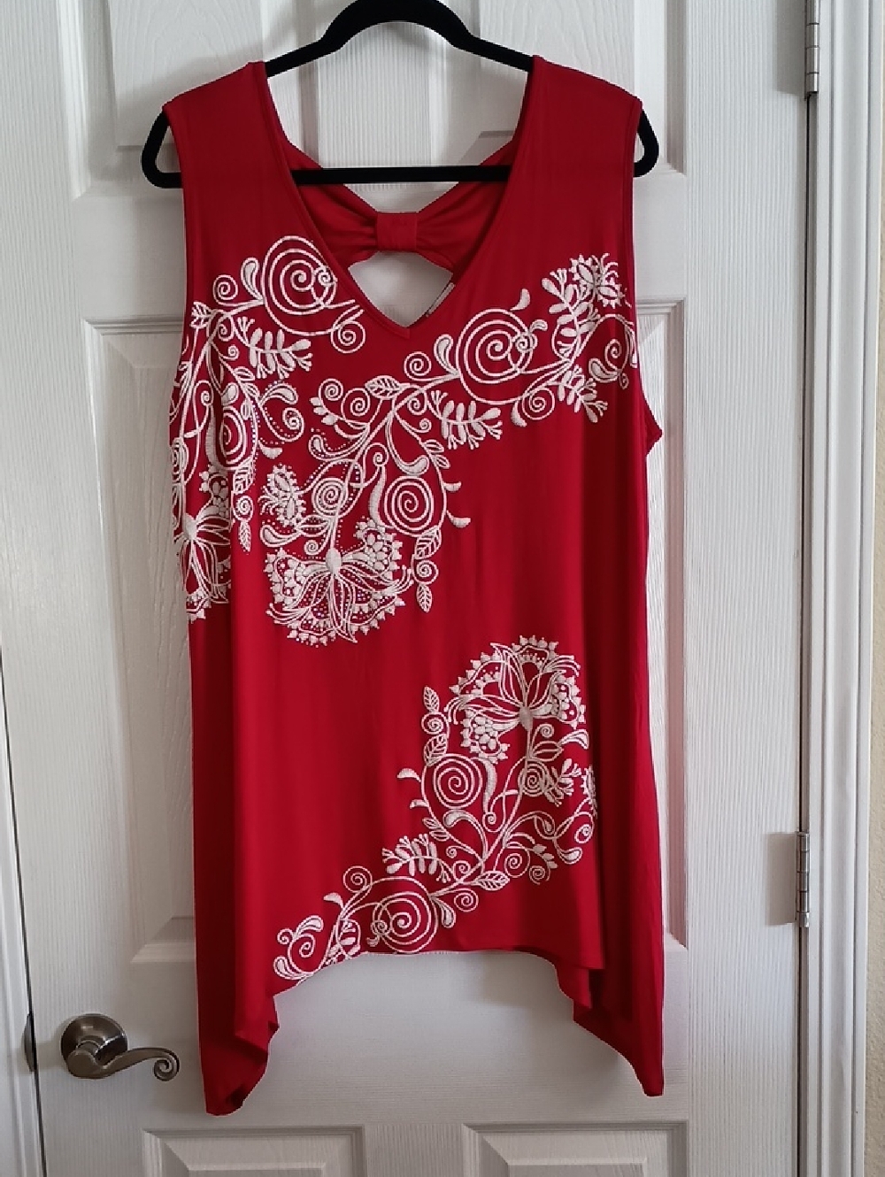 Avenue Sleeveless Sharkbite Rhinestone Blouse Tunic